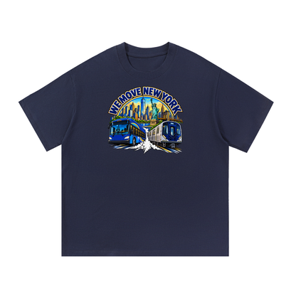 We Move New York Tee — navy heavyweight cotton with the NY transit badge featuring the Manhattan skyline, Statue of Liberty, bus, and subway train, printed on the front.