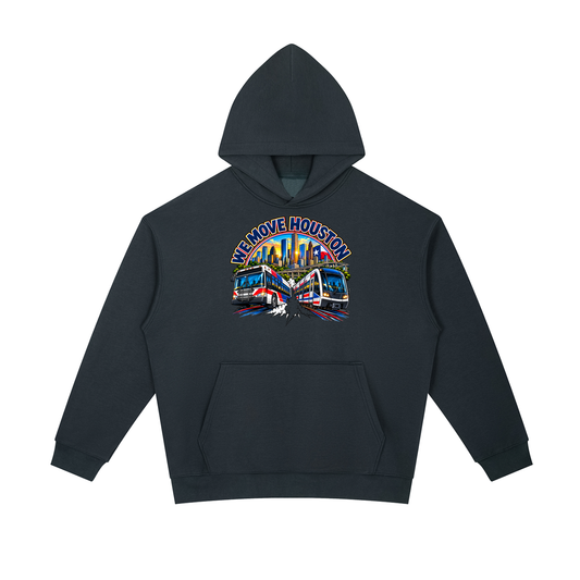 We Move Houston Pullover Hoodie — navy heavyweight brushed fleece with the HOU transit badge printed on left chest and full back, featuring the Houston skyline, METRORail, and bus.